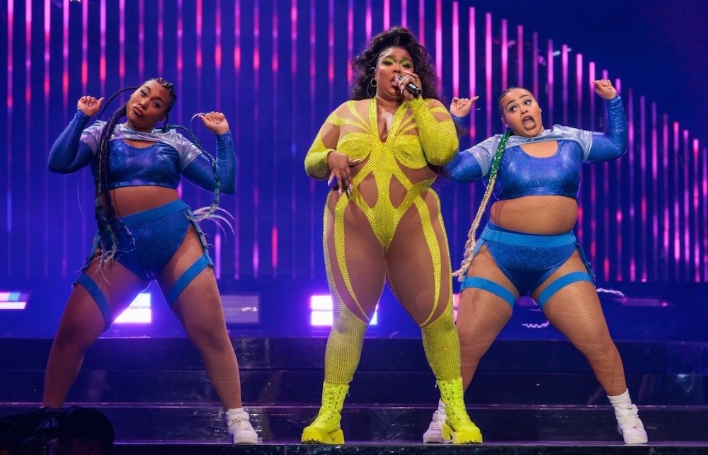 Crystal Williams (left) dances beside pop icon Lizzo.